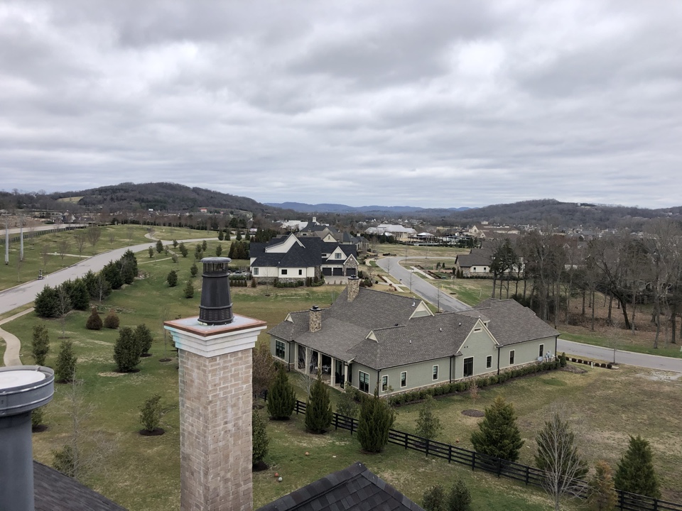 A Roof inspection with a view in College Geove!