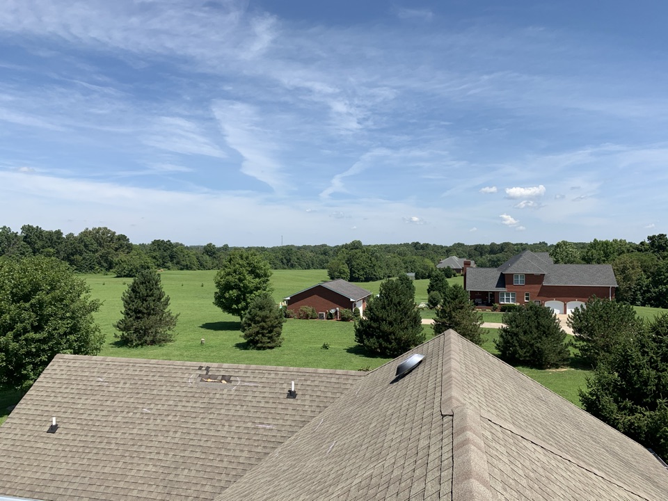 Roof inspection in Clarksville. Great day for it. Beautiful country up here. 