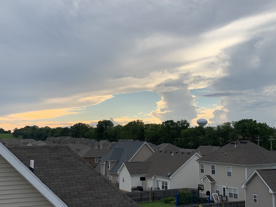 Roof inspection for the best view in town. Rooftop sunset in Spring Hill. 