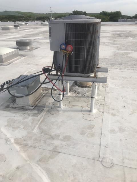 During this commercial ac repair we found that the system was not cooling. Our technician reviewed the entire system, and found the following issues: That the system is leaking and the condenser fan motor rusted out. Due to the age of the system, we recommend replacement over repair. 

