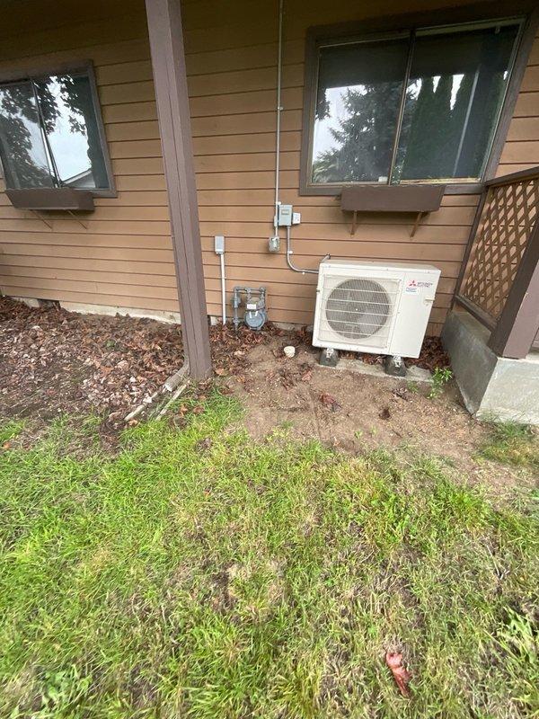 Responded to mainline backup affecting all fixtures in single-bathroom residence. Upon arrival, confirmed wastewater backing up into bathtub when toilets flushed and laundry drained. No accessible cleanout located on property. Excavated exterior ground near foundation to establish access point to main sewer line. Successfully cleared blockage using cable machine, restoring proper drainage to all plumbing fixtures. Tested system by running water through multiple fixtures simultaneously to verify clearance and proper flow.