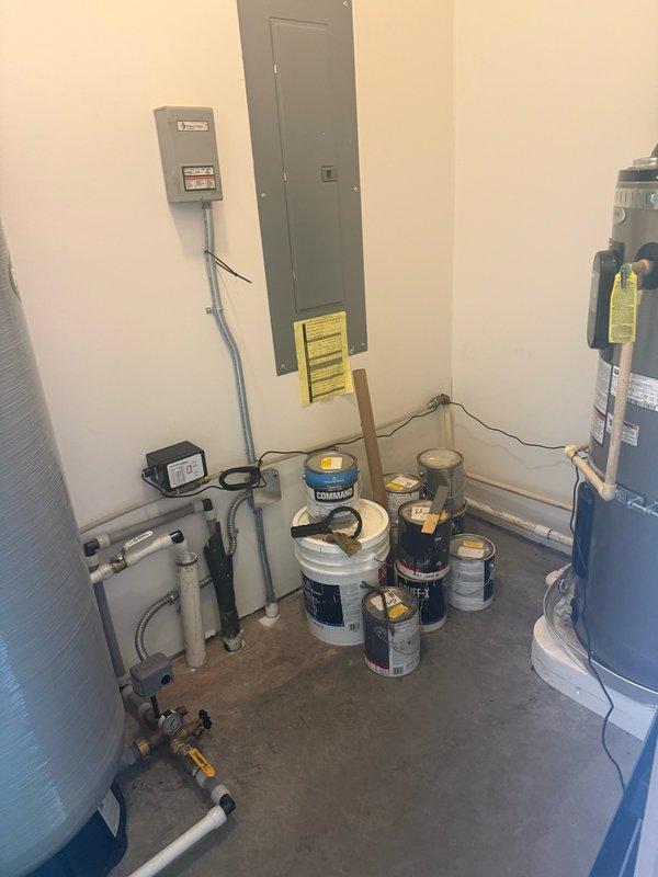 Responded to service call regarding loss of water pressure following filter replacement. Upon arrival, inspected well system components located on property and examined indoor plumbing infrastructure in utility room. Documented existing conditions of well tank, pressure system, and associated piping. Verified electrical panel connections and reviewed water heater plumbing connections. Investigation revealed potential issues with pressure tank system or filter installation requiring further diagnostics to restore proper water pressure to residence.
