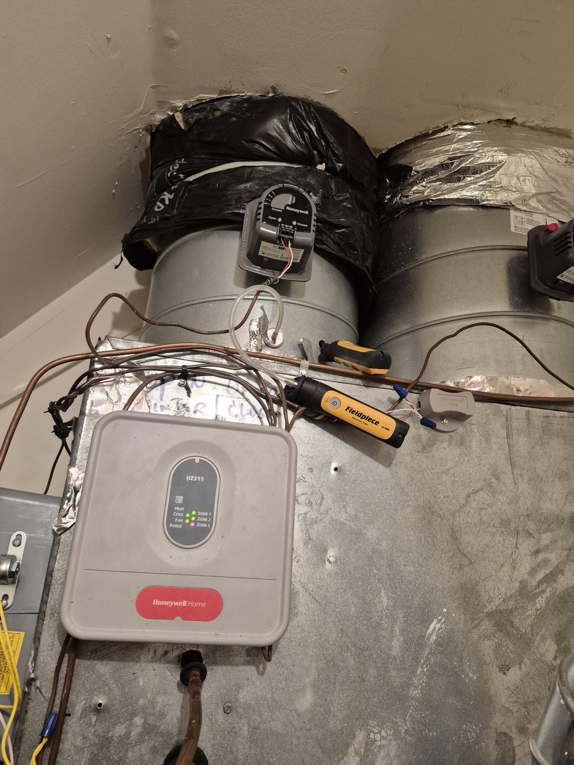 Arrived on site for no cooling. Customer said that the unit can cool the house around late evening but during the day it struggles. Famous that would be set to 72 it would only be at 76 lowest. Air handler and condenser turned on normally. Inserted temperature probes and manometer into the unit. Hooked up a few piece gauges on the condenser to check out pressures. The pressure's on the unit were pretty low. Low side being 42 and high side being 220. Temperature difference inside the house was 10°. Recharged the unit with 3 lb and 3 oz of refrigerant. Low side went up to 103 high side went up to 270. Temperature difference was increased from 11 to 23, the supply vent went from supplying 62° to 48°.
And gave a condenser outside a light wash from the outside with some chemical water to get better readings. Customer acknowledge of the job that was done today, recharging the unit, acknowledge and signed off.