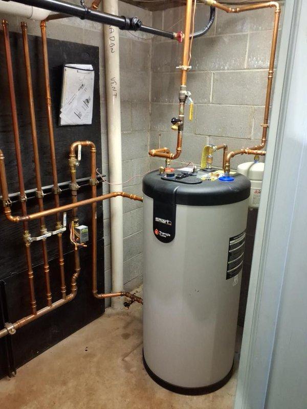 Responded to no hot water and no heat call. Upon arrival, inspected wall-mounted boiler system and domestic hot water heater serving the residence. Evaluated extensive copper piping manifold configuration, expansion tank, circulator pump, and zone valves throughout the heating distribution system. Diagnosed system failure affecting both space heating and domestic hot water production. Performed necessary repairs to restore boiler operation and verified proper function of all heating zones. Tested domestic hot water heater connections and confirmed adequate hot water delivery. Cycled system through complete heating cycle, verified circulator pump operation, checked expansion tank pressure, and confirmed all zone valves responding appropriately. System restored to full operational status with both heat and hot water functioning normally throughout the residence.