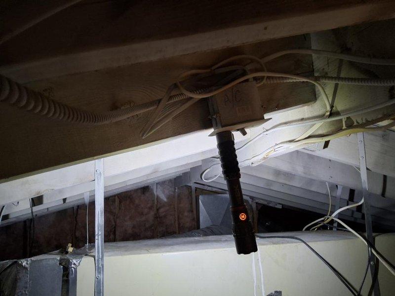 Performed comprehensive assessment of existing air conditioning system per customer request for replacement unit. Documented current equipment condition including outdoor condenser unit and electrical disconnect components. Inspection revealed aging system with visible wear on electrical disconnect box showing corrosion, debris accumulation, and weathered fuse assembly. Photographed equipment specifications and existing installation for replacement estimate preparation. Provided customer with equipment upgrade options and system replacement recommendations based on current unit age and condition.