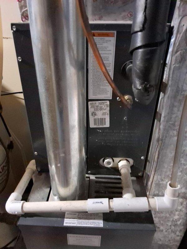 Completed full system replacement due to condenser damage from falling ice. Removed existing R410A system and installed new Goodman condenser unit with R454b refrigerant on existing concrete pad. Replaced indoor evaporator coil mounted on furnace to ensure compliance with current code requirements for refrigerant leak detection system. Connected electrical service, refrigerant lines, and condensate drainage. System tested and operational.