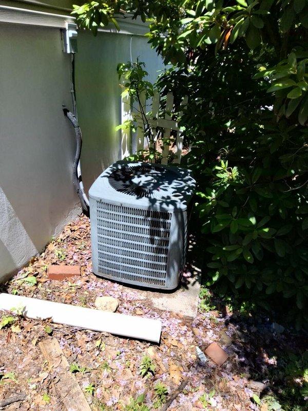Conducted estimate for residential HVAC system replacement on 15+ year old air conditioning unit with reported refrigerant leak and potential furnace compatibility issues. Inspected outdoor condenser unit showing signs of age and deterioration, evaluated electrical disconnect box exhibiting significant corrosion and wear, and assessed system compatibility requirements. Documented equipment condition through photographs and provided recommendations for complete system replacement to address refrigerant leak concerns and ensure proper AC/furnace compatibility.