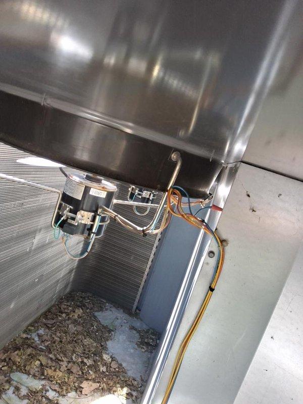 Responded to urgent no cooling call at commercial building. Upon arrival, performed system assessment to identify affected unit among multiple HVAC systems on property. Conducted visual inspection of outdoor condensing unit and associated components, including compressor, condenser coil, refrigerant lines, and electrical connections. Documented equipment conditions with photographs showing copper line sets, condenser coil with aluminum fins, and overall installation configuration. System evaluated for proper operation and potential causes of cooling failure.