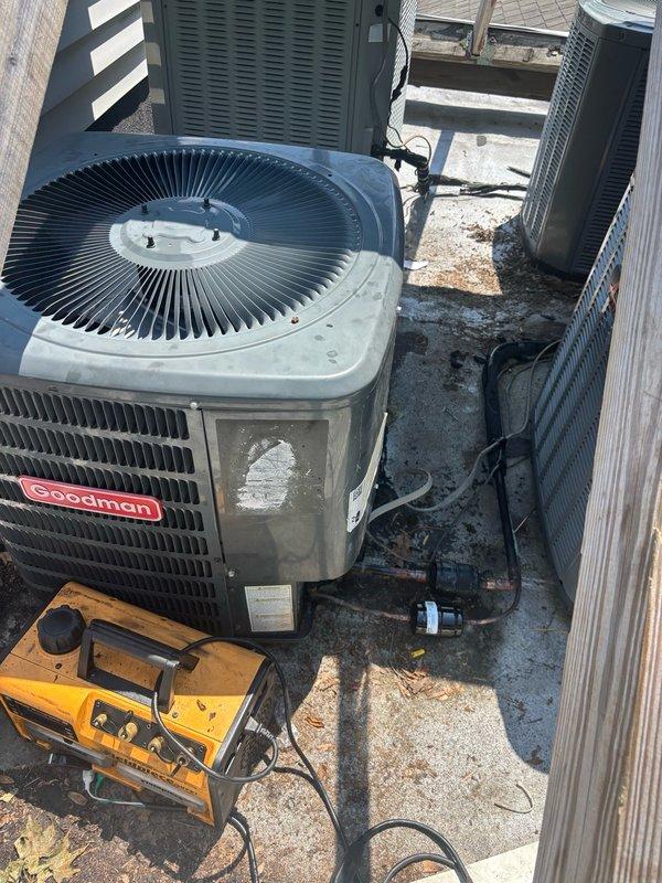 Replaced failed compressor on rooftop condenser unit and installed acid cleanup kit to remove contaminants from the refrigerant system. Installed new dual capacitor and contactor to restore proper operation and ensure reliable system performance.