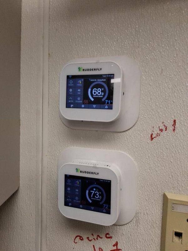 Responded to no cooling call and performed diagnostic evaluation of HVAC system. Upon arrival, accessed unit interior compartment and conducted comprehensive inspection of electrical components, refrigerant lines, and control systems. Verified proper connections at control board terminal blocks and examined capacitors for functionality. Checked thermostat operation on dual Budderfly digital controls, noting temperature differentials between set points and actual readings. Utilized diagnostic testing equipment to assess system performance parameters and documented equipment condition through photographic record for service file.