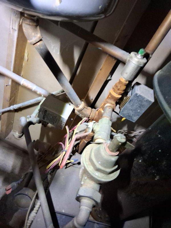 Arrived within scheduled window to perform AC estimate. Upon inspection of the mechanical room, evaluated the existing HVAC system including the gas furnace, water heater, and associated piping and ductwork. Documented current equipment condition through photographs showing copper refrigerant lines, PVC condensate piping, electrical connections, and mechanical components. Assessed the furnace unit for potential replacement needs based on age, wear patterns, and operational status. Examined all interconnected systems including ductwork, gas lines, water lines, and electrical connections to determine compatibility requirements for potential equipment upgrades. Provided comprehensive estimate for AC installation and discussed furnace replacement options with recommendations based on system evaluation.