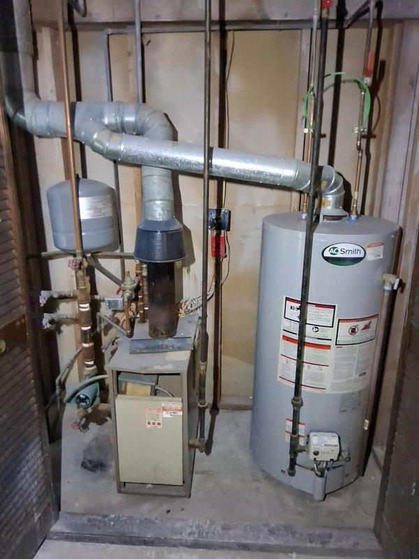 Arrived within scheduled window to perform AC estimate. Upon inspection of the mechanical room, evaluated the existing HVAC system including the gas furnace, water heater, and associated piping and ductwork. Documented current equipment condition through photographs showing copper refrigerant lines, PVC condensate piping, electrical connections, and mechanical components. Assessed the furnace unit for potential replacement needs based on age, wear patterns, and operational status. Examined all interconnected systems including ductwork, gas lines, water lines, and electrical connections to determine compatibility requirements for potential equipment upgrades. Provided comprehensive estimate for AC installation and discussed furnace replacement options with recommendations based on system evaluation.