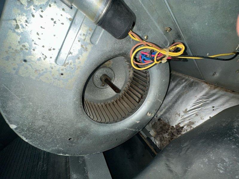 Completed seasonal maintenance on one air conditioning system. Replaced dirty air filter with new 20x25x1 filter to ensure proper airflow and system efficiency. Inspected blower motor assembly and blower wheel, noting dust and debris accumulation on fins and surrounding components typical of normal operation.