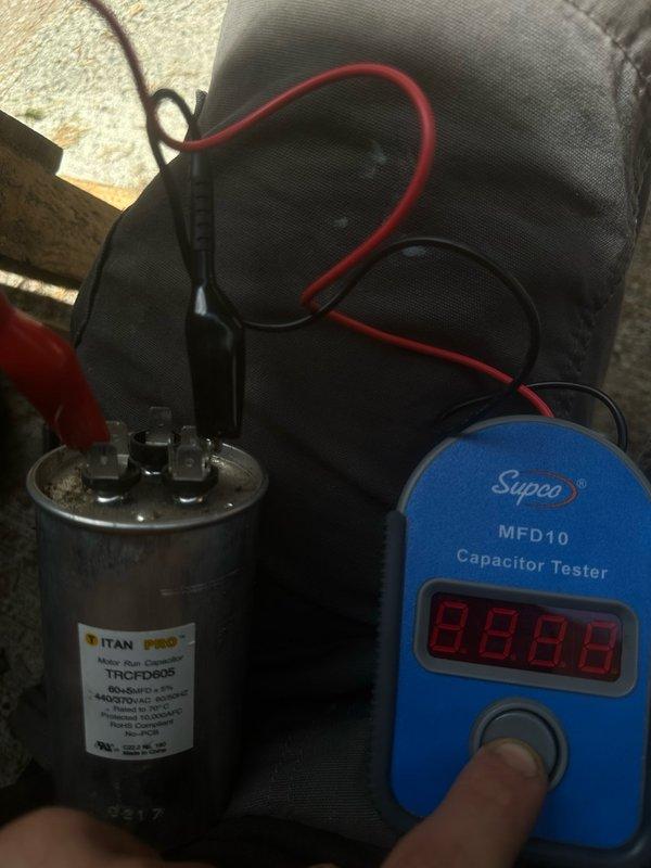 Completed seasonal maintenance on residential air conditioning system. Performed comprehensive inspection of outdoor condenser unit, including testing of dual run capacitor which measured within acceptable range at 88.88 MFD using calibrated digital tester. Verified proper operation of all electrical components and inspected refrigerant line connections for secure mounting and potential leaks. System operating normally with no deficiencies noted at time of service.