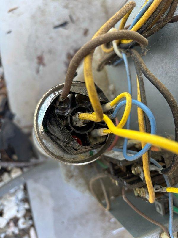 Completed seasonal maintenance on one air conditioning system. Performed comprehensive inspection of electrical components including motor connections and capacitor. Inspected all wiring terminals, verified proper electrical connections, and checked capacitor for signs of wear or failure. All components were found to be operational with normal age-related wear present. System tested and confirmed to be functioning properly.