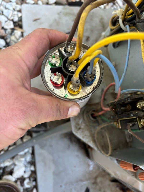 Completed seasonal maintenance on one air conditioning system. Performed comprehensive inspection of electrical components including motor connections and capacitor. Inspected all wiring terminals, verified proper electrical connections, and checked capacitor for signs of wear or failure. All components were found to be operational with normal age-related wear present. System tested and confirmed to be functioning properly.