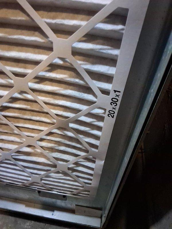 Conducted comprehensive air conditioning system assessment for prospective property buyer. Performed thorough inspection of HVAC unit including examination of 20x30x4 pleated air filter condition, internal electrical components, control board functionality, and wiring connections. Documented system condition with detailed photographs of filter housing and internal control panel components for buyer's review.