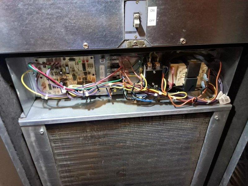 Conducted comprehensive air conditioning system assessment for prospective property buyer. Performed thorough inspection of HVAC unit including examination of 20x30x4 pleated air filter condition, internal electrical components, control board functionality, and wiring connections. Documented system condition with detailed photographs of filter housing and internal control panel components for buyer's review.