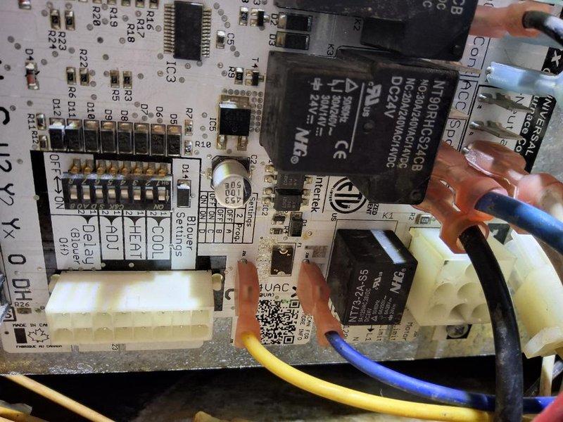 # No AC - Wiring Issue Resolution

Responded to no cooling complaint and diagnosed faulty wiring connections on the HVAC control board. Upon inspection, identified loose and improperly terminated wire connections at the terminal block and relay circuit that were preventing the system from operating. Removed and reinstalled affected wire connections, ensuring proper seating in all terminal blocks and connector housings. Verified all relay switches, including the HJR-4102-L-12VDC relay and DELTA relay, were functioning correctly. Tested all wire terminations for secure contact and proper voltage delivery to control components. Restored power to the system and confirmed proper operation of all circuits. System tested successfully with all functions operating as designed.