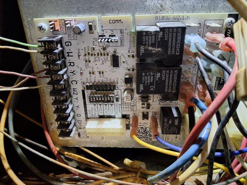 # No AC - Wiring Issue Resolution

Responded to no cooling complaint and diagnosed faulty wiring connections on the HVAC control board. Upon inspection, identified loose and improperly terminated wire connections at the terminal block and relay circuit that were preventing the system from operating. Removed and reinstalled affected wire connections, ensuring proper seating in all terminal blocks and connector housings. Verified all relay switches, including the HJR-4102-L-12VDC relay and DELTA relay, were functioning correctly. Tested all wire terminations for secure contact and proper voltage delivery to control components. Restored power to the system and confirmed proper operation of all circuits. System tested successfully with all functions operating as designed.
