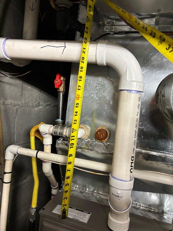 Responded to complaint of insufficient cooling on first floor. Performed system inspection of Coleman furnace and HVAC components in basement. Measured and documented clearances, verified proper installation of condensate drain lines, PVC venting, and ductwork connections. All components found to be properly installed with adequate clearances maintained per manufacturer specifications.