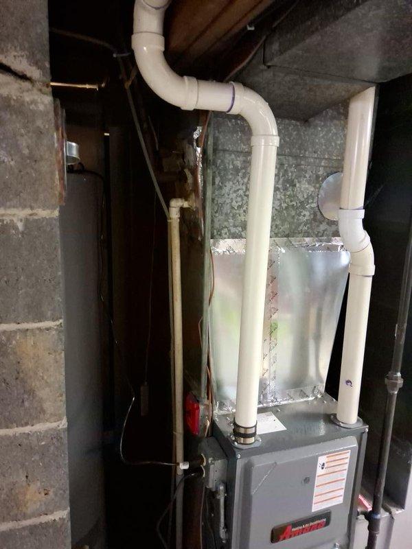 Conducted on-site evaluation at rental property for complete AC system replacement. Documented existing electrical panel configuration showing dedicated AC circuit breaker and assessed basement mechanical room housing current furnace and HVAC infrastructure. Provided comprehensive replacement estimate for new single-zone air conditioning system installation.