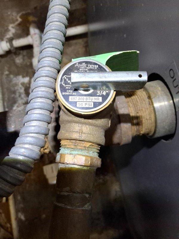 Responded to no heat call and diagnosed faulty temperature and pressure relief valve on water heater that was actively leaking. Replaced defective relief valve with new Apollo 300,000 BTU/HR, 50 PSI rated valve, ensuring proper installation and secure threaded connections. Tested system operation and verified no leaks present upon completion.