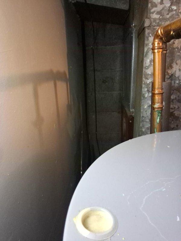 Completed comprehensive estimate for full HVAC system replacement including air conditioning unit and furnace in residential property. Assessed existing equipment location in basement utility area, documented current installation conditions including ductwork configuration and available space for new equipment, and photographed water heater proximity to determine optimal placement for replacement units while ensuring proper clearances and code compliance.