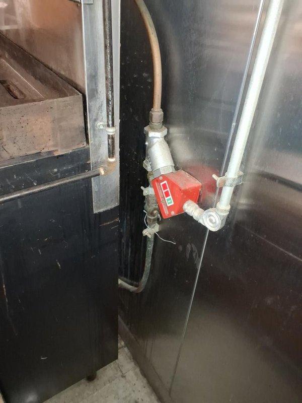 Conducted comprehensive walkthrough of gas piping installation to assess remaining work required for project completion. Documented existing mechanical systems including pump assembly, PVC piping configurations, and aging gas line components showing significant corrosion on mounting hardware and deterioration of pipe surfaces requiring attention before final system activation.