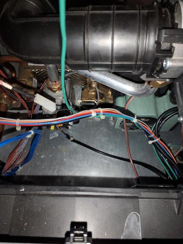 Responded to no hot water complaint and successfully replaced the flow sensor manifold on the water heating system. The faulty flow sensor was preventing proper hot water delivery, and after installing the new manifold assembly and verifying all electrical connections and plumbing fittings, the system was restored to full operation with hot water flow confirmed.