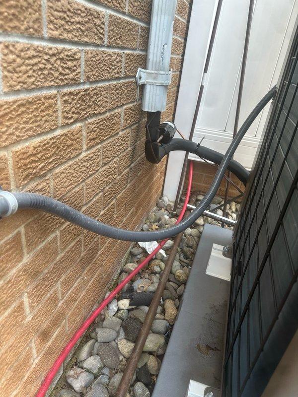 Replaced failed electrical disconnect on outdoor AC condenser unit. Installed new DiversiTech disconnect box with ICM517A specifications, mounted securely to exterior brick wall with proper conduit connections to ensure safe power supply to the system.