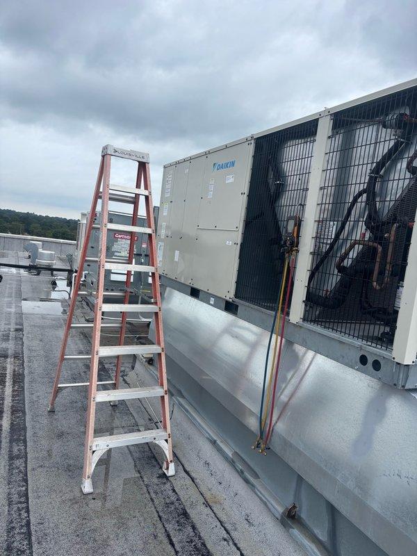 Responded to service call for commercial Daikin rooftop unit experiencing short cycling issues following module replacement from previous day. Performed diagnostic testing using digital manifold gauge, which revealed abnormal pressure readings indicating potential refrigerant charge imbalance or compressor cycling problem. Investigated electrical connections and control board operation to identify root cause of intermittent on/off cycling behavior and determine necessary corrective action to restore normal unit operation.