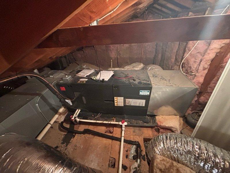 Responded to no cooling complaint with system blowing warm air. Accessed attic-mounted air handler and performed diagnostic testing using digital manifold gauges. Measurements revealed abnormal superheat reading of 46.4°F and subcooling of 43.6°F, indicating refrigerant system issue requiring further evaluation and repair to restore proper cooling operation.