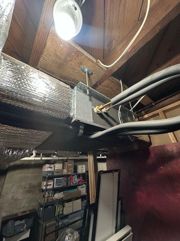 Responded to service call for lack of cooling in guest room and master bedroom. Upon inspection, discovered inadequate airflow from supply registers in affected areas. Investigated HVAC system in basement and identified disconnected or improperly sealed flex ductwork serving the upstairs zones. Reconnected and secured all duct connections, verified proper airflow at return air grille, and confirmed system operation. Both rooms now receiving adequate conditioned air with proper temperature differential.