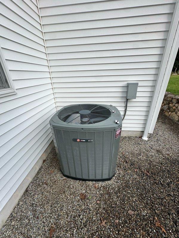 Performed comprehensive leak test on residential split-system Trane air conditioning unit. Inspected outdoor condensing unit and indoor air handler with associated ductwork in attic space. Tested refrigerant lines, connections, and system components for leaks; verified system integrity and proper operation of all equipment.