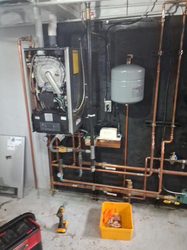 Completed comprehensive preventive maintenance and tune-up on gas-fired boiler heating system. Performed full inspection of boiler unit, copper piping network, expansion tank, circulation pump, and all associated valves and fittings. Verified proper operation of all system components, checked for leaks throughout the piping assembly, and confirmed adequate system pressurization. Cleaned and serviced boiler internals, tested safety controls, and ensured all shut-off valves were functioning correctly for optimal system performance and reliability.
