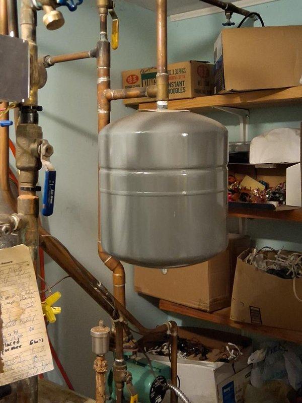 Responded to no heat call and performed oil heating system maintenance. Inspected and serviced oil burner components, including primary control, oil filter, and fuel delivery system. Verified proper operation of expansion tank and associated hydronic heating piping. Checked system pressures and confirmed all valves functioning correctly. System restored to normal operation with heat confirmed at thermostat.