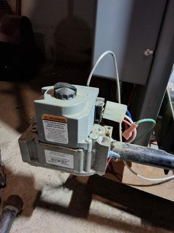 Responded to a no-heat call and diagnosed a failed gas valve as the cause of the loss of heat. Replaced the gas valve, reconnected the wiring harness and control wiring, and verified secure connections at the valve and supply piping. System was returned to service, and the unit was confirmed to operate through a heating cycle with proper gas valve function.