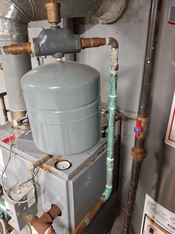 Replaced the failed gas valve on the boiler, disconnecting and reconnecting the gas piping at the union fittings and restoring the electrical connection to the new valve. Verified proper gas pressure and valve operation, and confirmed the boiler fired and returned to normal heating operation. Noted corrosion on the adjacent copper piping and rust at the galvanized union fittings and boiler cabinet, and recommended monitoring these areas for future leaks.