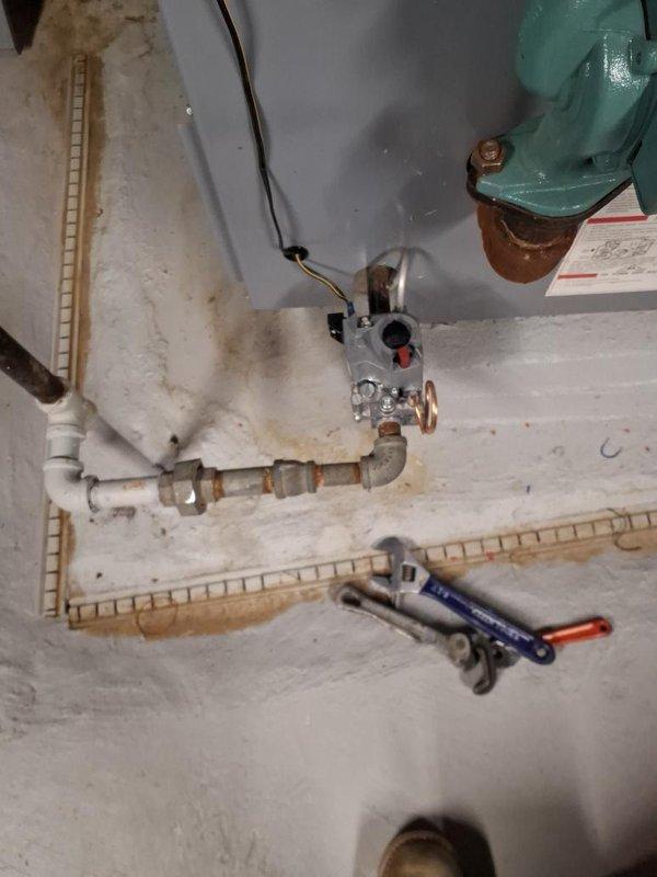 Replaced the failed gas valve on the boiler, disconnecting and reconnecting the gas piping at the union fittings and restoring the electrical connection to the new valve. Verified proper gas pressure and valve operation, and confirmed the boiler fired and returned to normal heating operation. Noted corrosion on the adjacent copper piping and rust at the galvanized union fittings and boiler cabinet, and recommended monitoring these areas for future leaks.