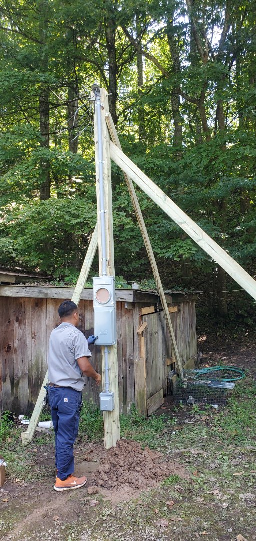 Electrician near me is installing a temporary power pole,  we are the best local Electricians and are experts in power outage repair!