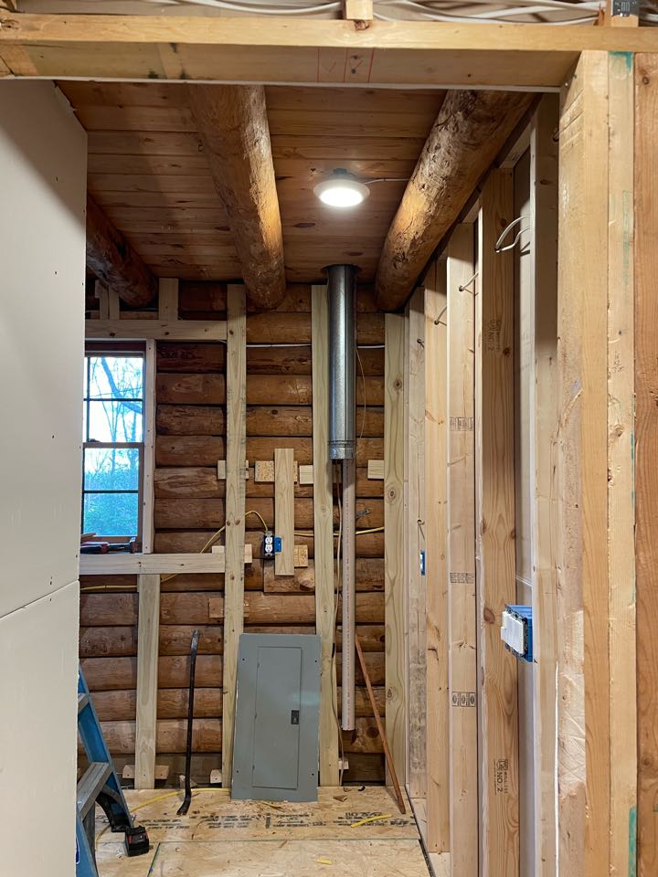 Electrician on Lookout Mountain installing LEDs lights in a cabin in new switches Electrician on Lookout Mountain installing LEDs lights in a cabin in new switches