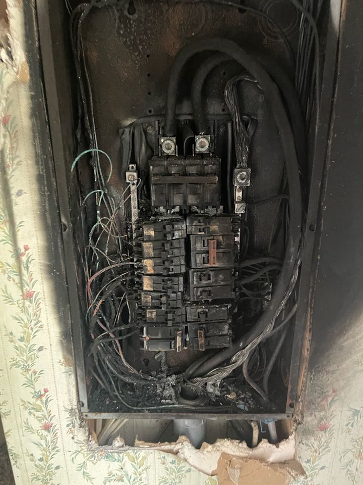 Electrician is replacing a homes electrical system 