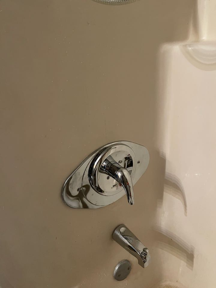 Plumber installed new toilets in bathrooms and changed shower valve 