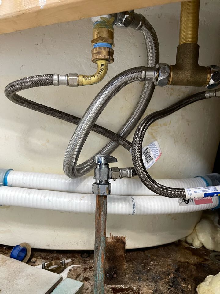 Plumber locating leak in house coming from bathroom and repaired water line 