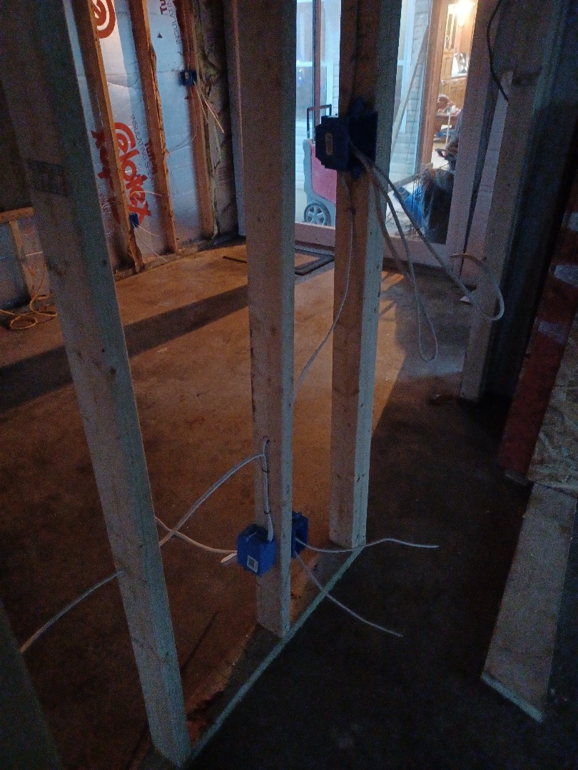 Electrician wiring a addition