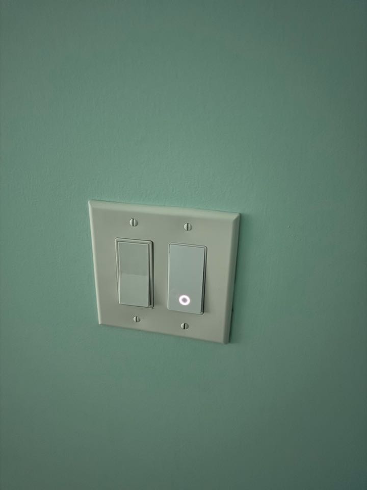 Electrician Installing smart switches