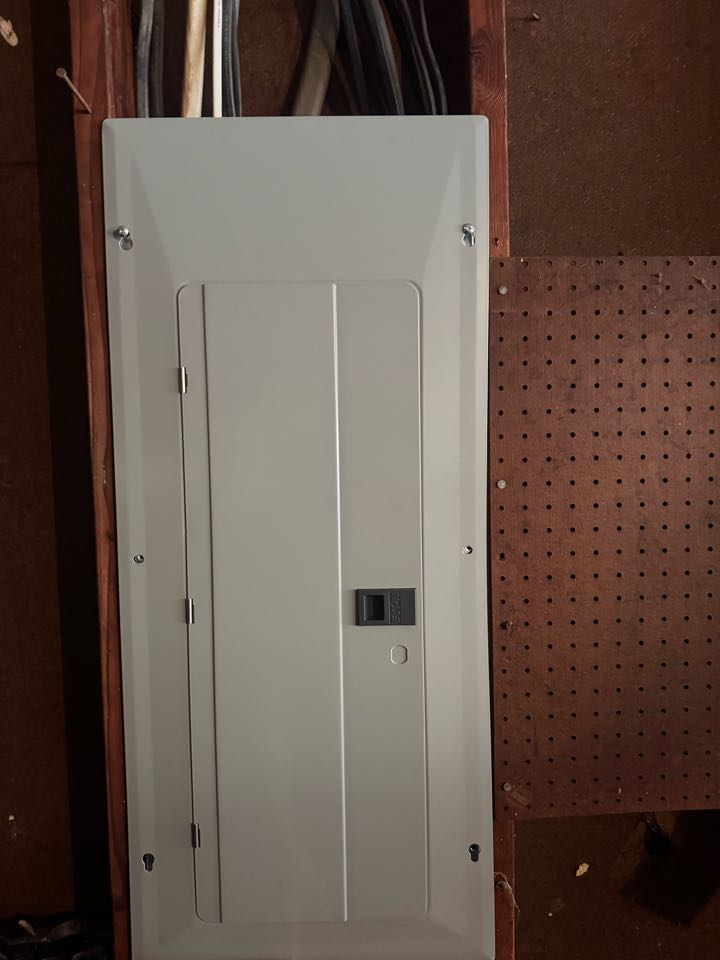Electrician replacing panel. 