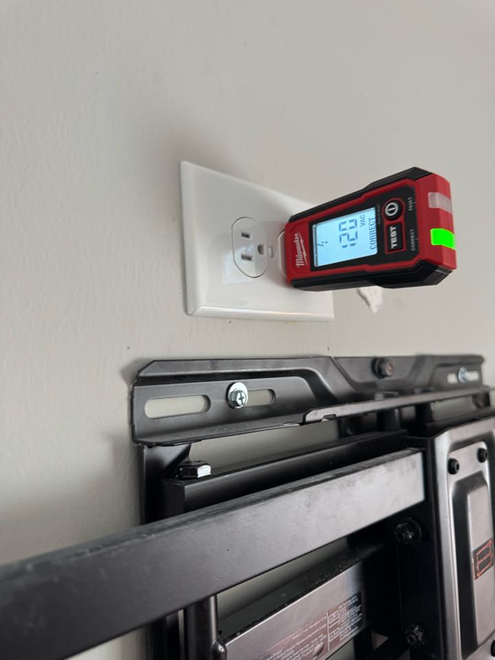 Electrician adding TV plug