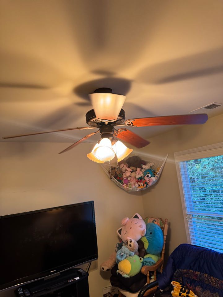 Electrician replacing light switch to fix fan light. 